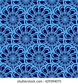 Seamless creative hand-drawn pattern of stylized flowers in bright cyan and indigo colors. Vector illustration.