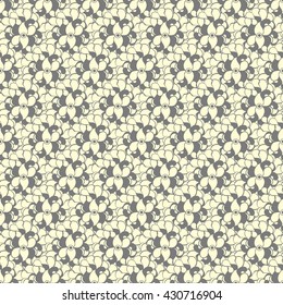 Seamless creative hand-drawn pattern of stylized flowers in pale yellow and gray colors. Vector illustration.