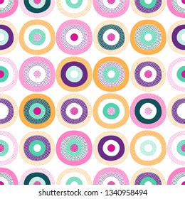 Seamless creative stylish doodle dots playful pattern. Naive repeated funny circle shape print