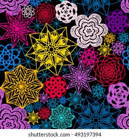 Seamless crochet flowers pattern. Crochet blanket of floral elements, handmade, multicolored knitted snowflakes, cozy blanket.
