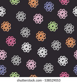 Seamless crochet flowers pattern. Crochet blanket of floral elements, handmade, multicolored knitted snowflakes, cozy blanket.