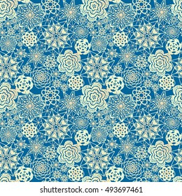 Seamless crochet flowers pattern. New Year, Christmas background. Crochet blanket of floral elements, handmade, multicolored knitted snowflakes, cozy blanket.