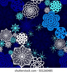 Seamless crochet flowers pattern. New Year, Christmas background. Crochet blanket of floral elements, handmade, multicolored knitted snowflakes, cozy blanket.