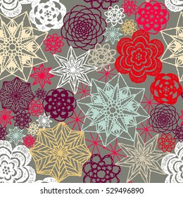 Seamless crochet flowers pattern. New Year, Christmas background. Crochet blanket of floral elements, handmade, multicolored knitted snowflakes, cozy blanket.