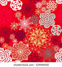Seamless crochet flowers pattern. New Year, Christmas background. Crochet blanket of floral elements, handmade, multicolored knitted snowflakes, cozy blanket.