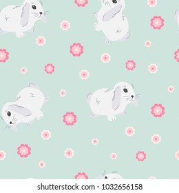 Seamless, cute baby pattern with hares and flowers on a green background. For decorating textiles, packaging and wallpaper. Vector illustration.