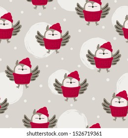 Seamless cute cartoon owls pattern. Winter vector illustration.