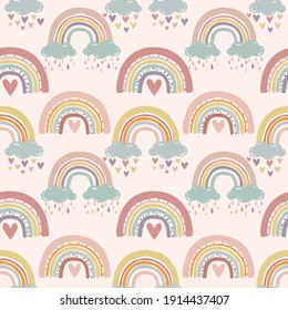 Seamless cute cartoon rainbow pattern with pastel colors for girl kids and baby fabric or wallpaper