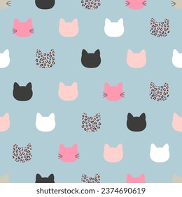 Seamless cute cats pattern. Vector illustration with cat heads. Childish print