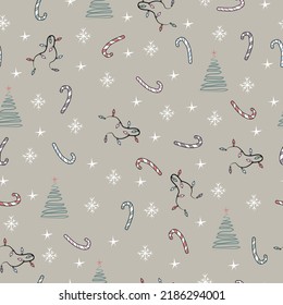 Seamless cute Christmas and New Year vector pattern with Christmas trees, sweets,garland and snowflakes and stars. For printing, packaging,textiles, web design,banner,wallpaper,children's design
