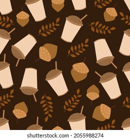 Seamless cute patern with coffee cup, leaf and acorn on brown background. Cute autumn pattern for printing on fabric, wrapping paper, wallpaper. Vector illustration in flat style 