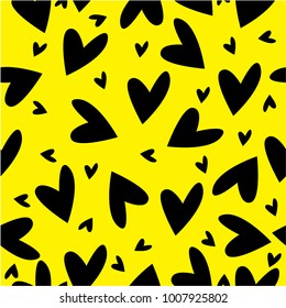Seamless cute pattern with black hearts on yellow backdrop. 
Romantic background design for wrapping paper, greeting cards, 
