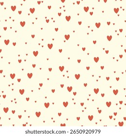 Patrón lindo sin fisuras con corazones rojos de diferentes tamaños sobre fondo claro. Patrón para papel de regalo, decoración, San Valentín.	
