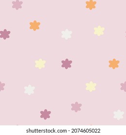 Seamless cute pattern with small flowers on a pink background. Floral pattern in pastel colors for printing