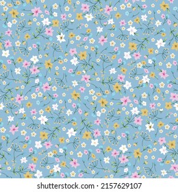 seamless cute small flower pattern on blue background