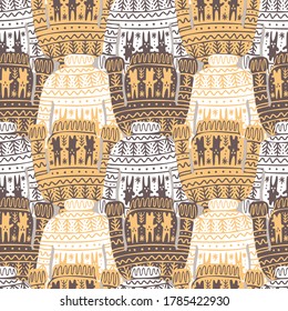 Seamless cute vector design of knitted ornamental colorful winter sweaters