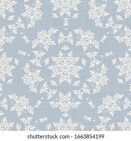 Seamless daisy pattern in french blue linen shabby chic style. Hand drawn floral damask texture. Old white blue background. Interior wallpaper home decor swatch. Ornate flourish motif all over print