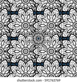 Seamless damask pattern background for wallpaper design in the style of Baroque. Golden pattern on blue background with white elements. Ornate vector decoration.