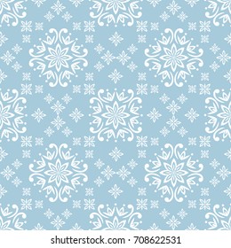 seamless damask pattern in blue. Vintage ornament. background for wallpaper, printing on the packaging paper, textiles, tile.