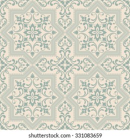 Seamless damask pattern in green and beige. Tile