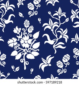 Seamless damask pattern with Victorian motifs. Royal French lilies, English hop cones. Vintage textile collection. White on blue.