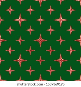 Seamless dark green background with red tetrahedral stars.