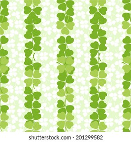 Seamless decorative floral pattern with clover, shamrocks