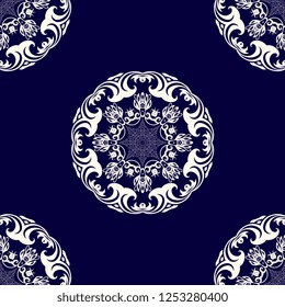 Seamless decorative floral white ornament on blue background. Seamless wallpaper pattern. Trendy wallpaper pattern