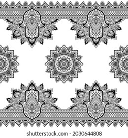 Seamless decorative ornament in ethnic oriental style. Circular pattern in form of mandala and Hamsa symbol for Henna, Mehndi, tattoo, decoration. Doodle outline hand draw vector illustration.