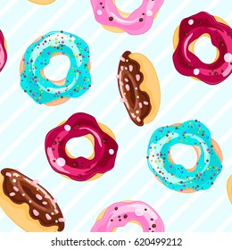 Seamless decorative pattern with donuts in cartoon style. Stripes background. Sweet pastry texture