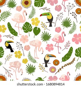 Seamless decorative pattern with flamingo, toucan and tropical leaves and flowers