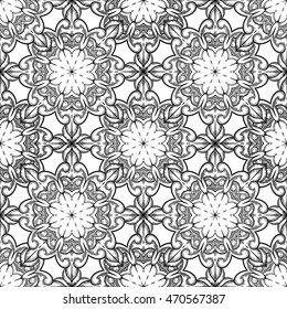Seamless decorative pattern. Ornament with mosaic elements. Vintage floral styling to design cards, corporate identity, textiles. Kaleidoscope. Graphics. Adult coloring