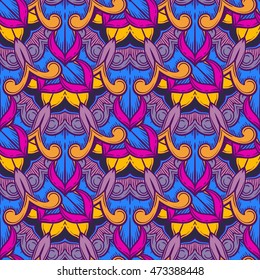 Seamless decorative pattern. Ornament with mosaic elements. Vintage floral styling to design cards, corporate identity, textiles. Kaleidoscope. Graphics.