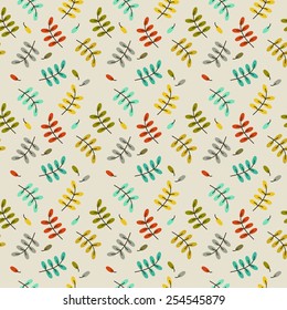 Seamless decorative template texture with colored leaves on beige background. Seamless stylized leaf pattern. 