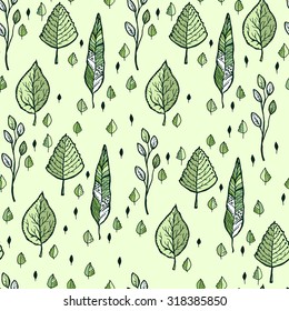 Seamless decorative template texture with green stylized hand drawn leaves. 