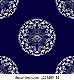 Seamless decorative white ornament on blue background. Seamless floral wallpaper pattern. Trendy wallpaper pattern
