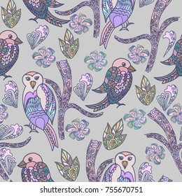 Seamless delicate ethnic pattern with birds and flowers. Vector hand drawn print for wallpaper, fabric design.