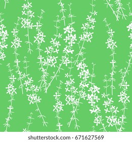 Seamless delicate floral pattern with white silhouetted boughs of wild flowers on a green background.