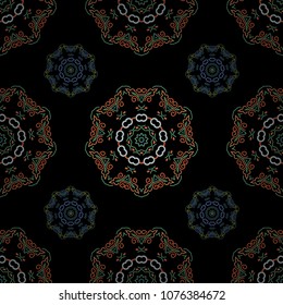 Seamless design on black background in orange, green and blue colors. Abstract seamless with Floral Elements. Vector winter pattern.