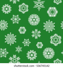 Seamless design on green background. Abstract seamless with Floral Elements. Vector winter pattern.