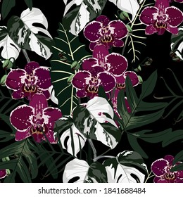 Seamless design pattern arranged with violet orchid flower, exotic palm monstera leaves. Beautiful floral print.  Black backgroun.