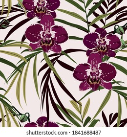 Seamless design pattern arranged with violet orchid flower, exotic palm leaves. Beautiful floral print.