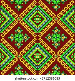 El diseño sin costuras utiliza Formas geométricas y patrones que recuerdan a la cultura indígena. Emplea colores verdes, amarillos y azules sobre un fondo marrón, dispuestos simétricamente. 
