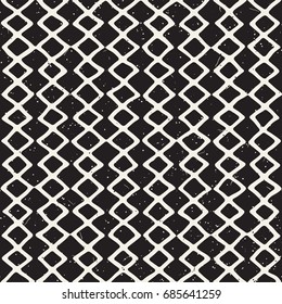 Seamless diamond pattern with hand drawn brush strokes. Ink doodle grunge illustration. Geometric monochrome vector pattern.