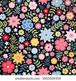 Seamless ditsy floral pattern with fantasy little flowers and leaves in folk style. Vector illustration. Print for fabric, paper, wallpaper, wrapping design. 