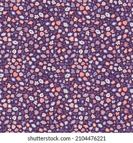 Seamless ditsy floral pattern in red and purple.