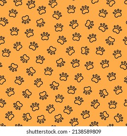 Seamless dog pattern with paw prints. Cat foots texture. Pattern with doggy pawprints. Orange dog texture. Hand drawn vector illustration in doodle style on orange background.