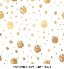 Seamless doodle design with gold painted dots on a white background. Vector illustration.