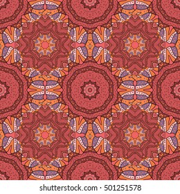 Seamless doodle floral pattern. Background with flower on pink background. Orange.