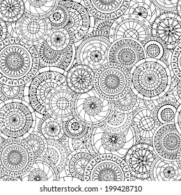 Seamless doodle flower background in vector with doodles, flowers and cucumbers. Circles ethnic floral pattern. Used Clipping mask for easy editing.